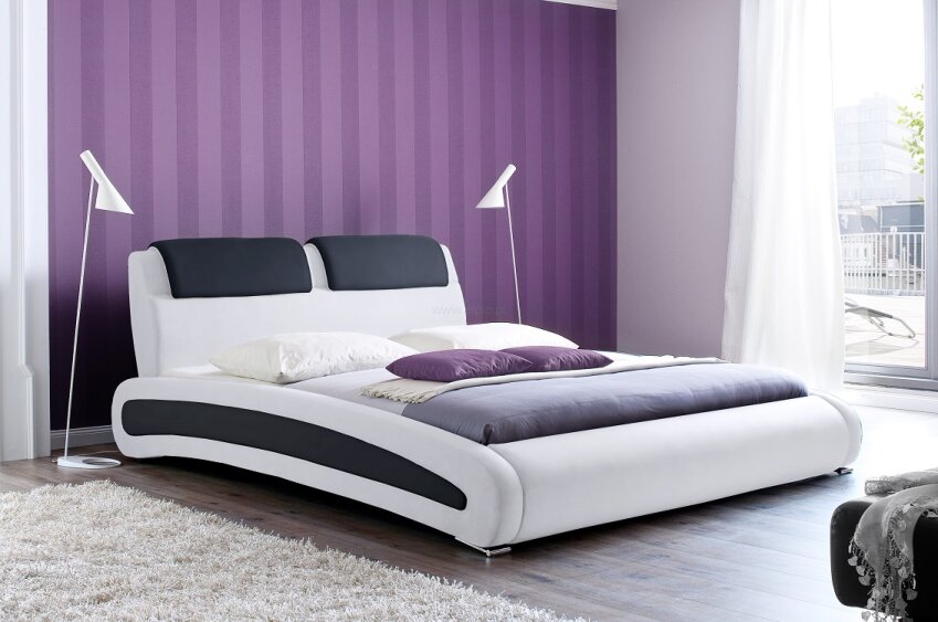 Cancun z kolekcji m.trade to łóżko tapicerowane ekoskórą białą z czarnymi wstawkami