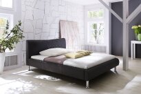 River MC Akcent - łóżko tapicerowane ekoskórą brązową z beżowymi szwami